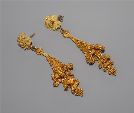 A pair of pierced yellow metal cannetile work drop earrings, 68mm.